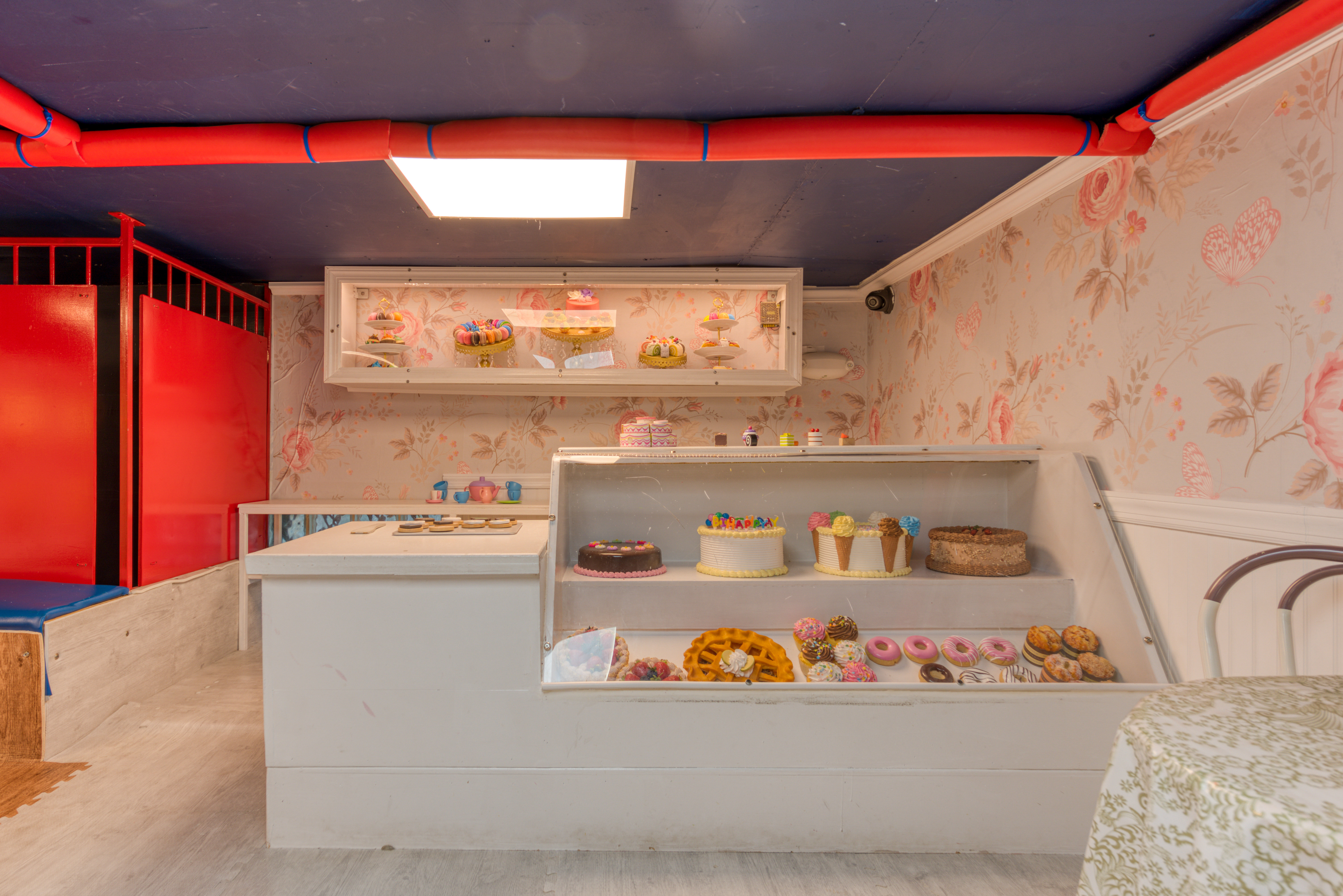 Children sliding down the indoor slides