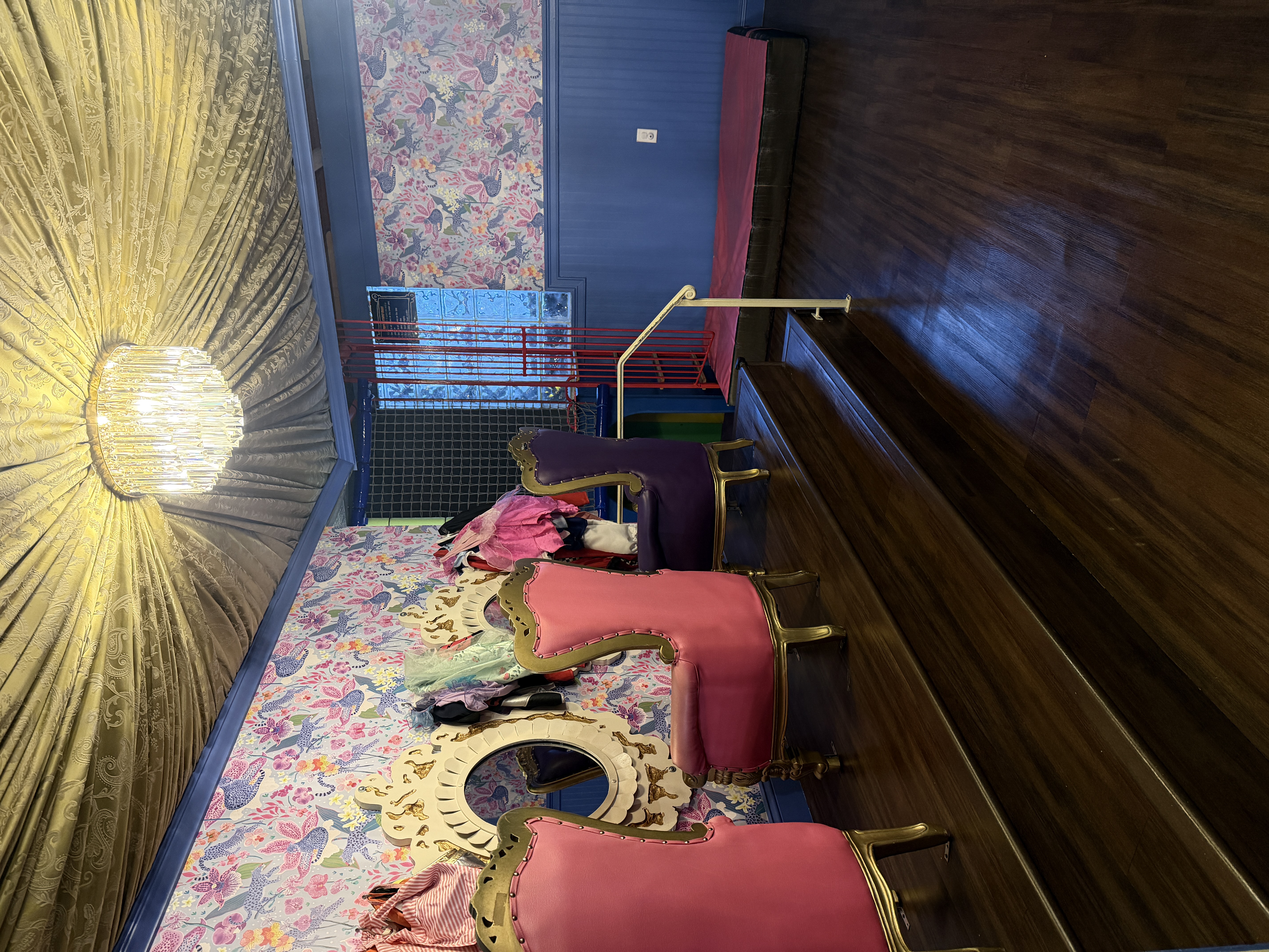 Children sliding down the indoor slides